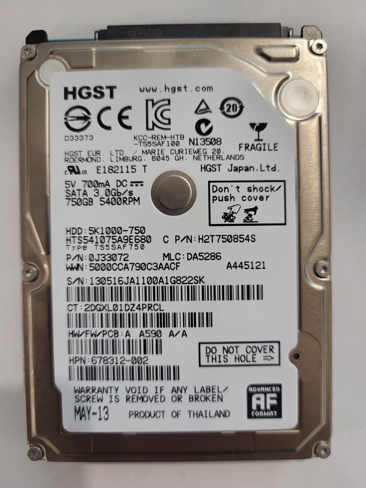 HTS541075A9E680, PN:0J33072, MLC:DA5286, MAY-13 | HGST 750Go 2,5" SATA HDD STK