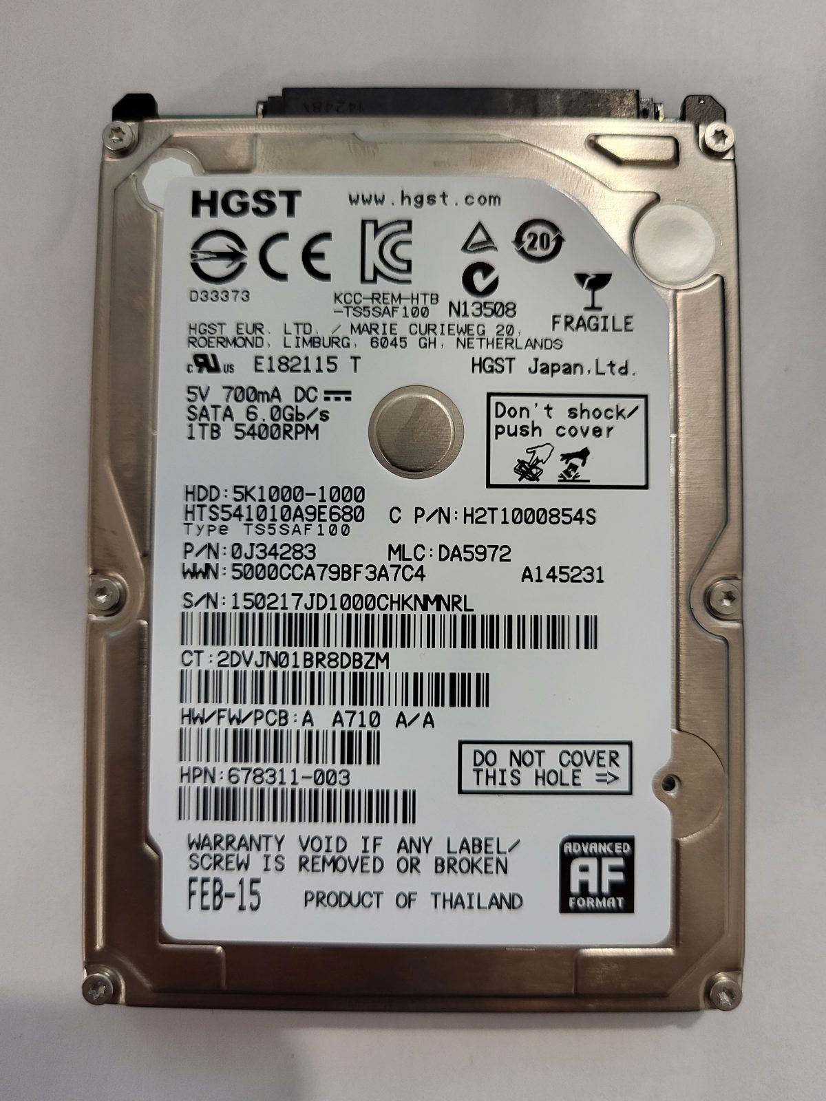 HTS541010A9E680, PN:0J34283, MLC:DA5972, FEB-15 | HGST 1To 2,5" SATA HDD STK