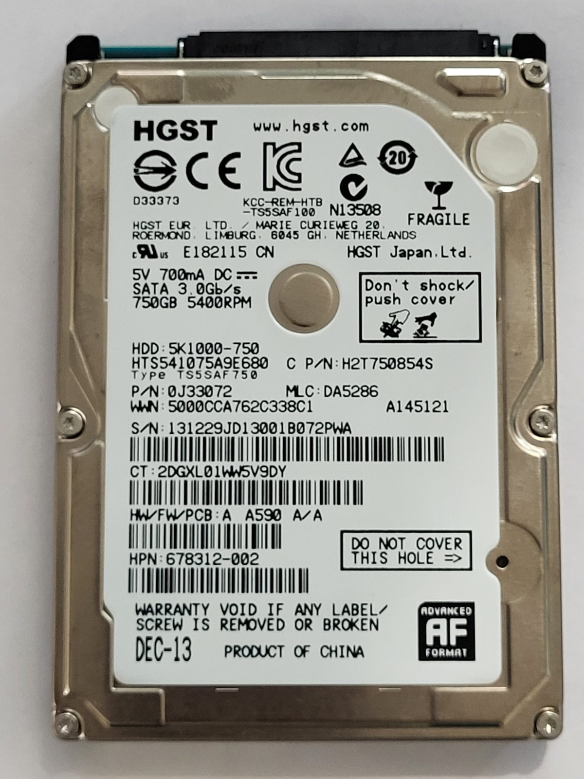 HTS541075A9E680, PN:0J33072, MLC:DA5286, DEC-13 | HGST 750Go 2,5" SATA HDD STK
