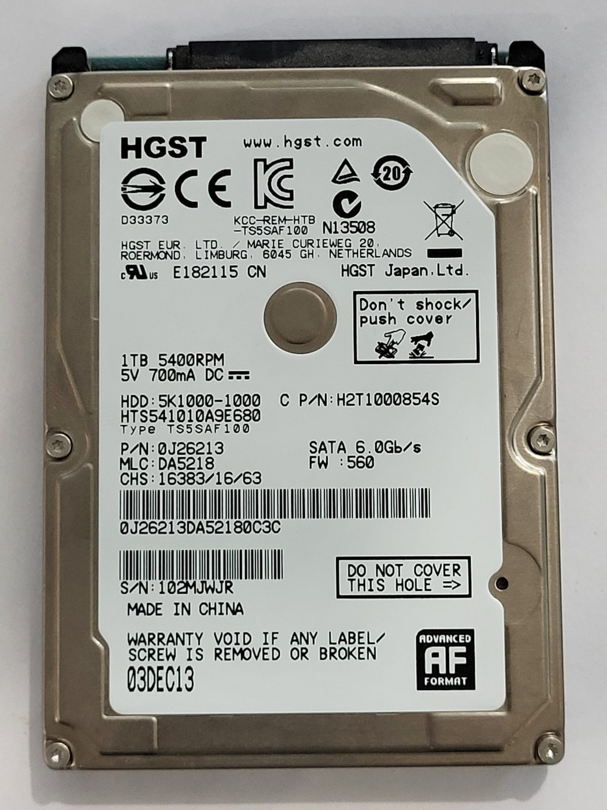 HTS541010A9E680, PN:0J26213, MLC:DA5218, 03 DEC 2013 | HGST 1To 2,5" SATA HDD STK