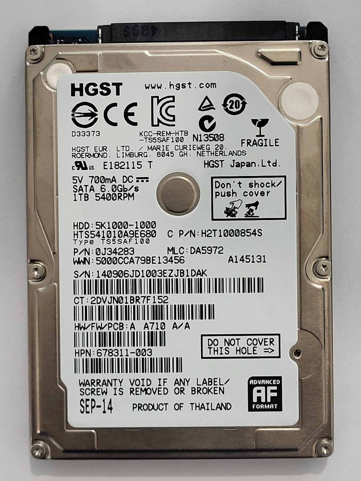 HTS541010A9E680, PN:0J34283, MLC:DA5972, SEP 14 | HGST 1To 2,5" SATA HDD STK