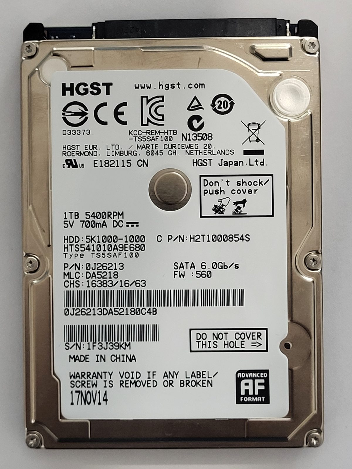 HTS541010A9E680, PN:0J26213, MLC:DA5218, 17 NOV 2014 | HGST 1To 2,5" SATA HDD STK