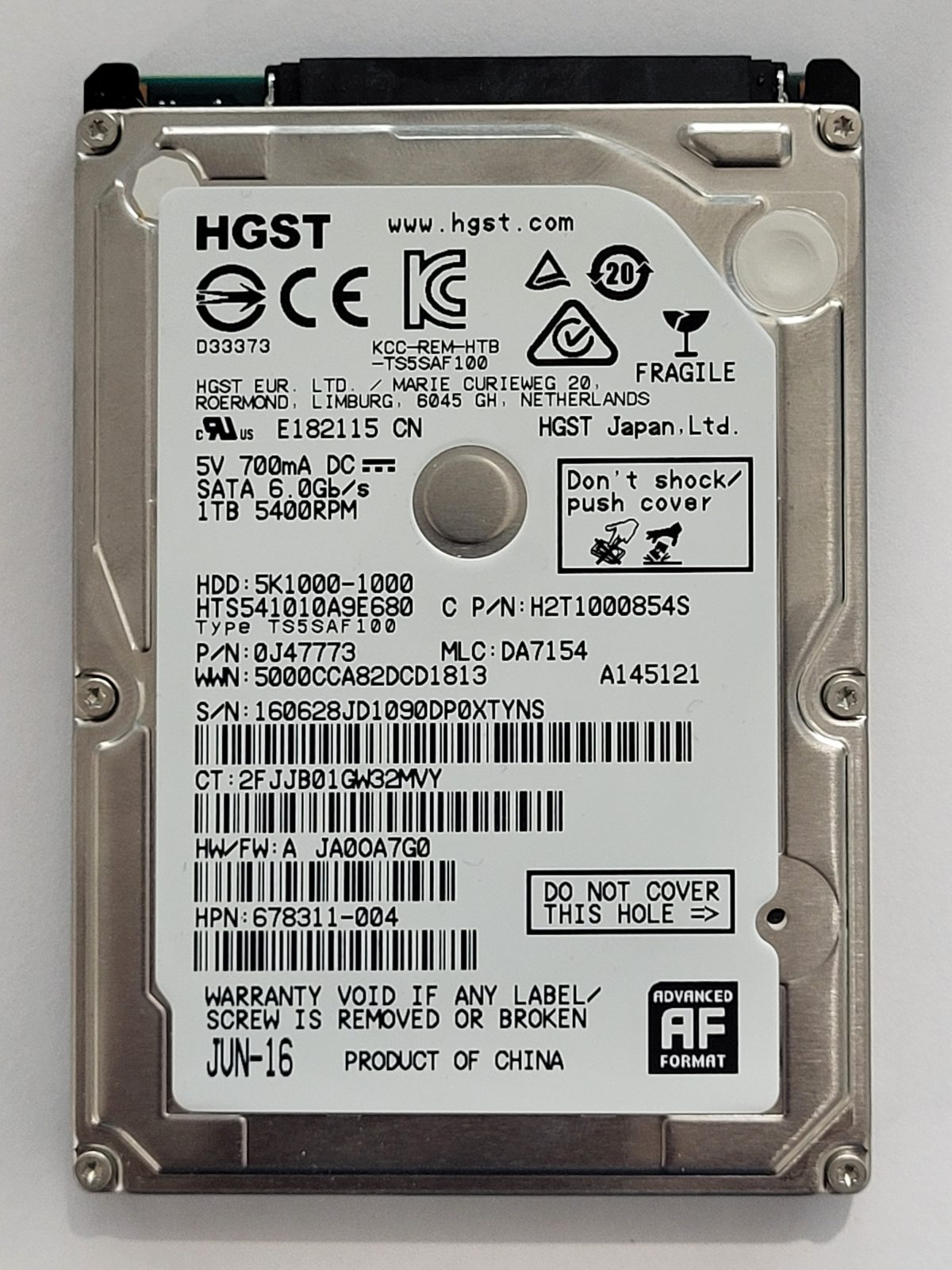 HTS541010A9E680, PN:0J47773, MLC:DA7154, JUN 16 | HGST 1To 2,5" SATA HDD STK