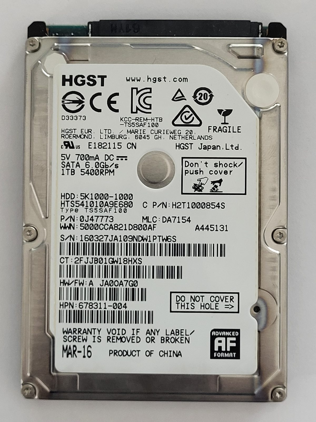 HTS541010A9E680, PN:0J47773, MLC:DA7154, MAR 16 | HGST 1To 2,5" SATA HDD STK