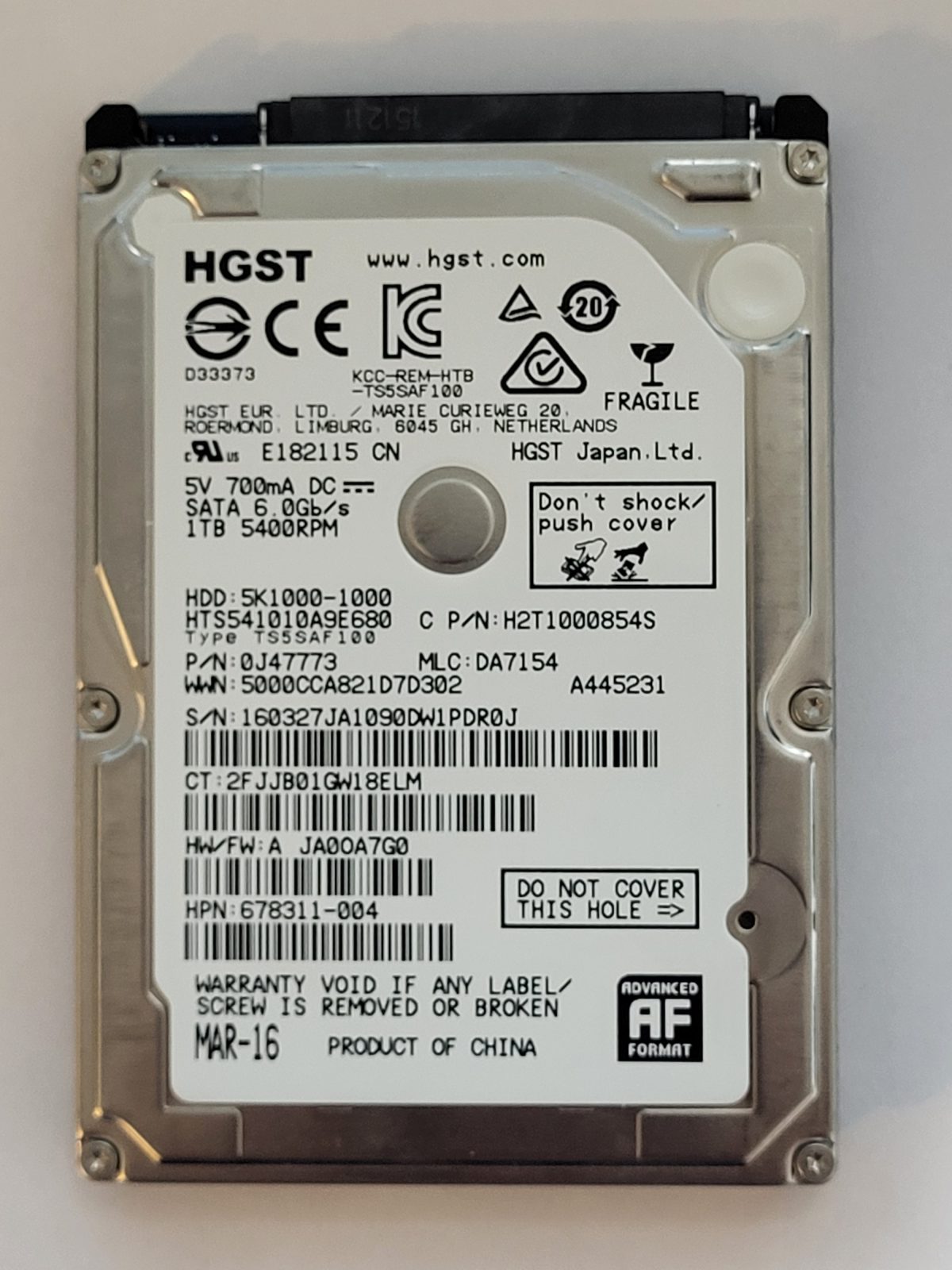 HTS541010A9E680, PN:0J47773, MLC:DA7154, MAR 16 | HGST 1To 2,5" SATA HDD STK