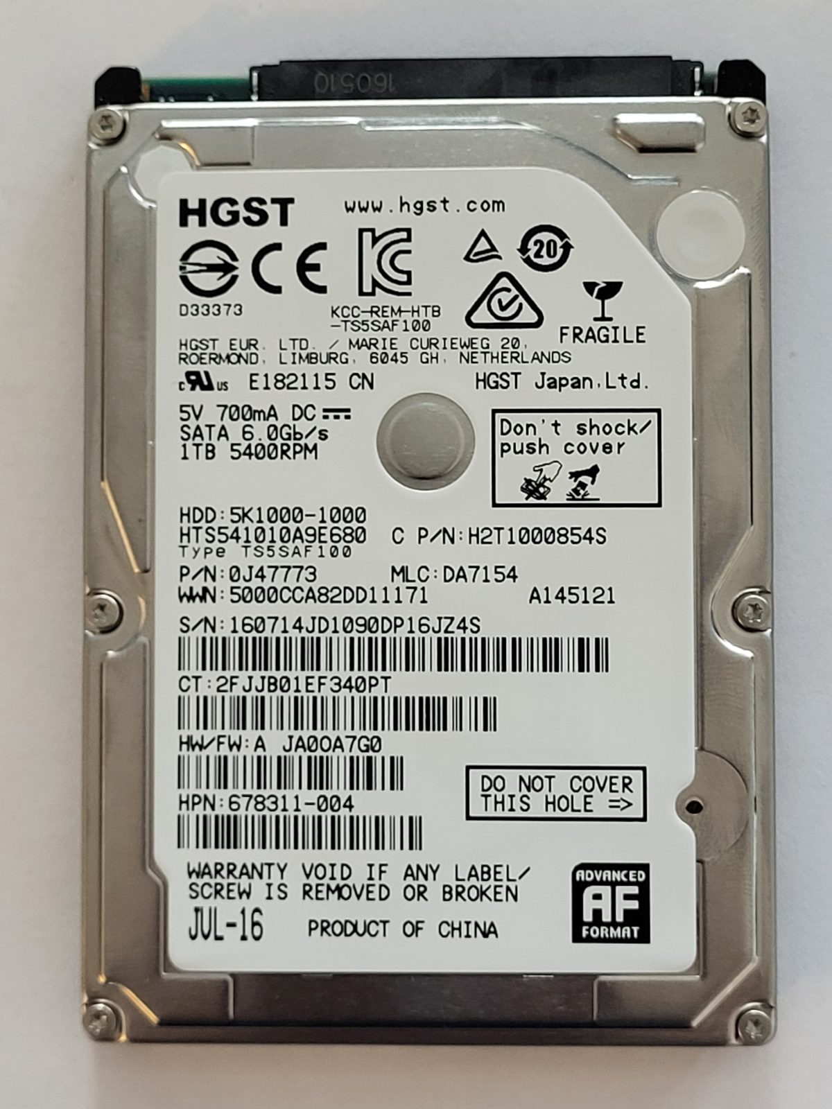 HTS541010A9E680, PN:0J47773, MLC:DA7154, JUL 16 | HGST 1To 2,5" SATA HDD STK