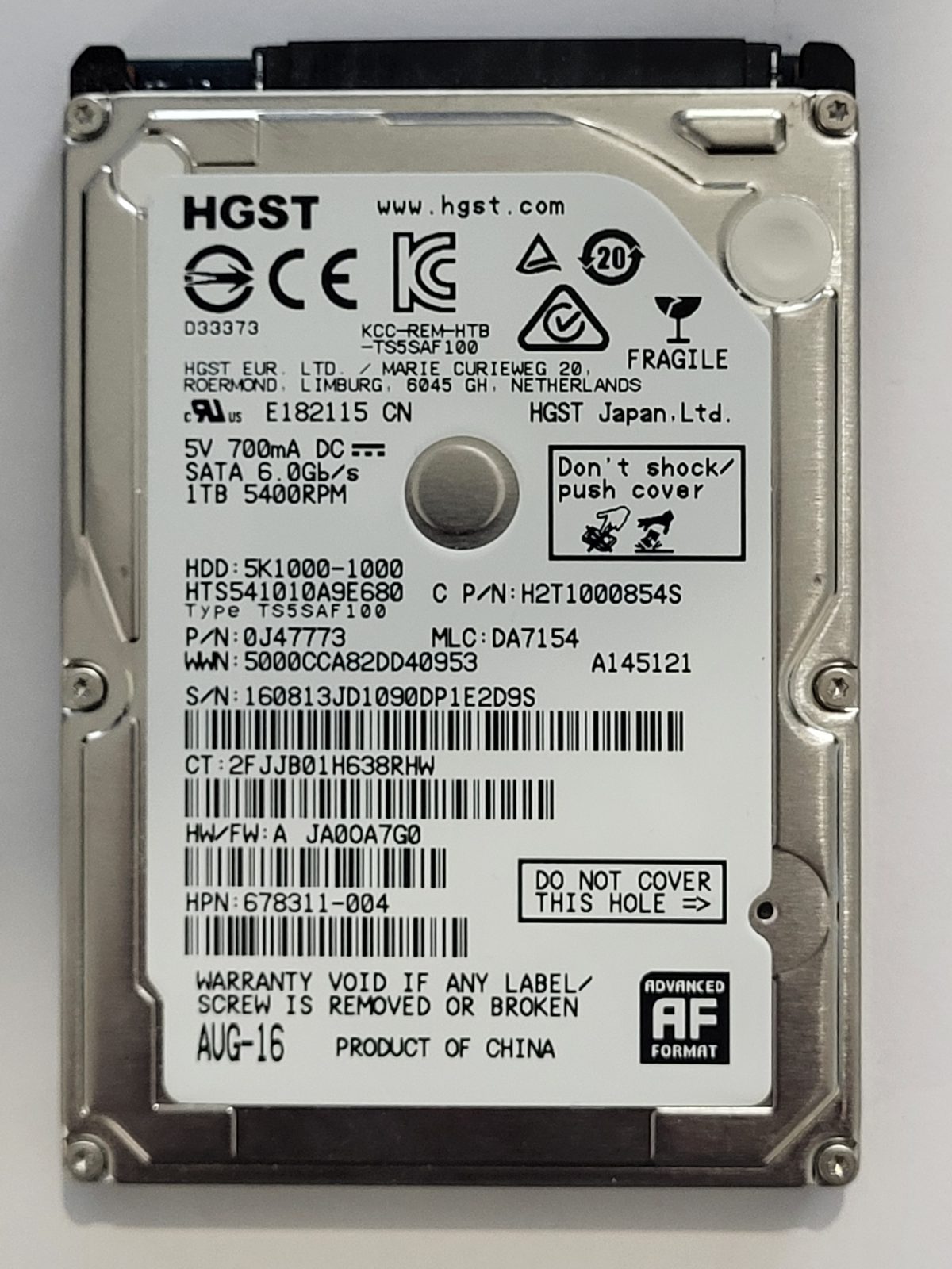 HTS541010A9E680, PN:0J47773, MLC:DA7154, AUG-16 | HGST 1To 2,5" SATA HDD STK