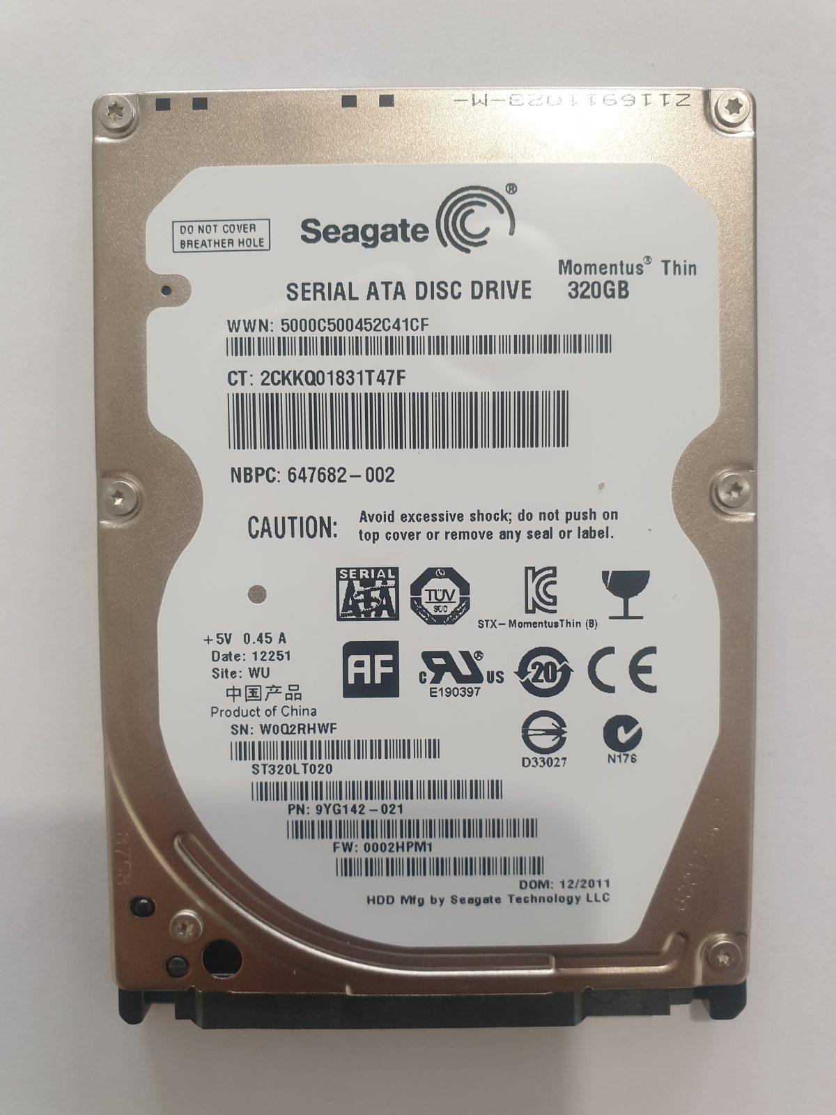 ST320LT020, PN:9YG142-021, SN:W0Q, WU, FW:0002HPM1, 12251 | Seagate 320Go 2,5" SATA HDD STK