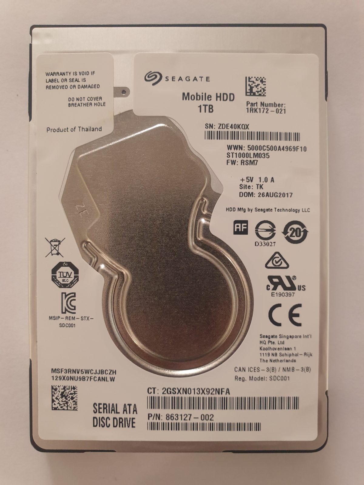 ST1000LM035, PN:1RK172-021, SN:ZDE, TK, FW:RSM7, 26 AUG 2017 | Seagate 1To 2,5" SATA HDD STK