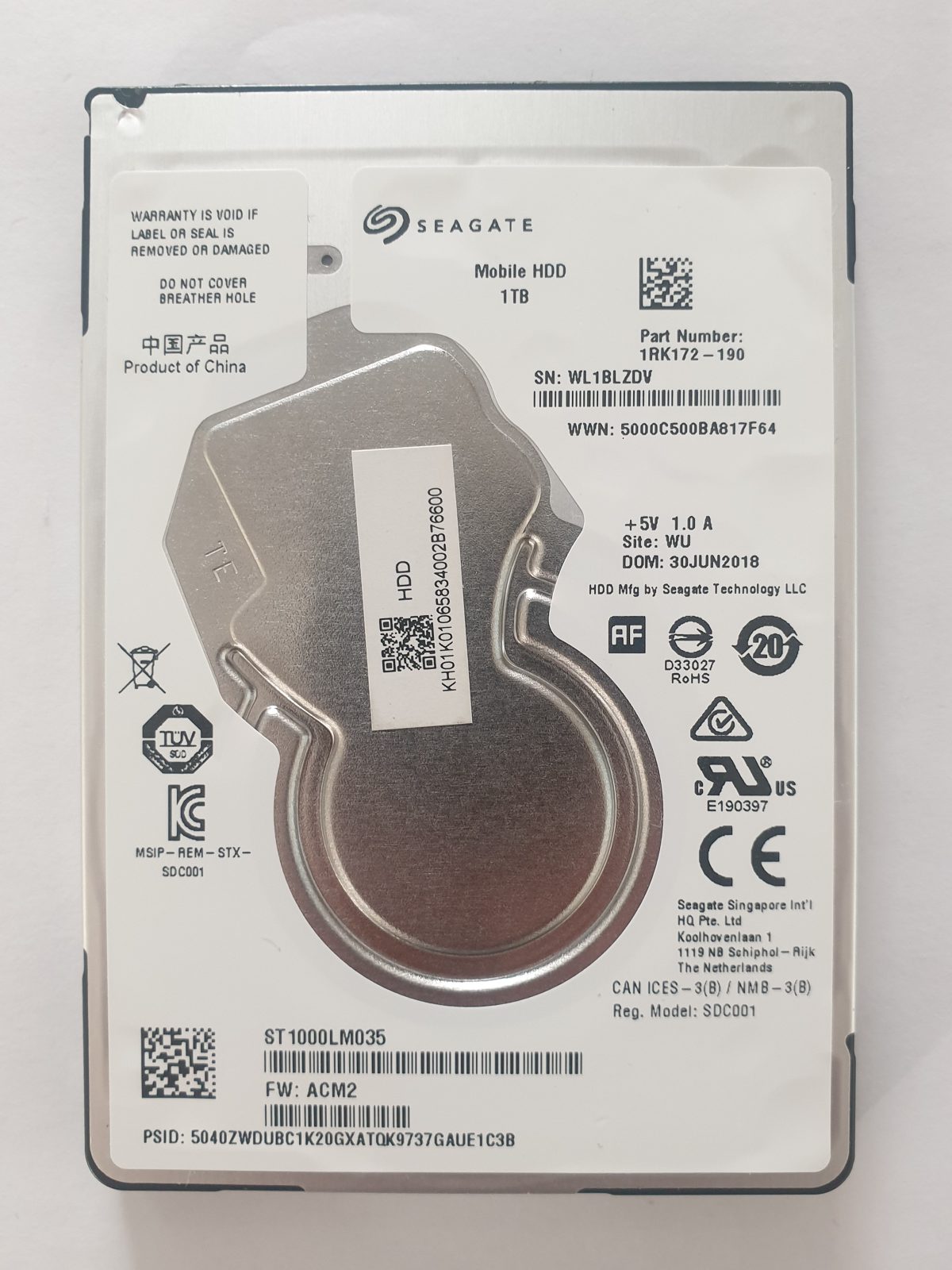 ST1000LM035, PN:1RK172-190, SN:WL1, WU, FW:ACM2, 30 JUN 2018 | Seagate 1To 2,5" SATA HDD STK