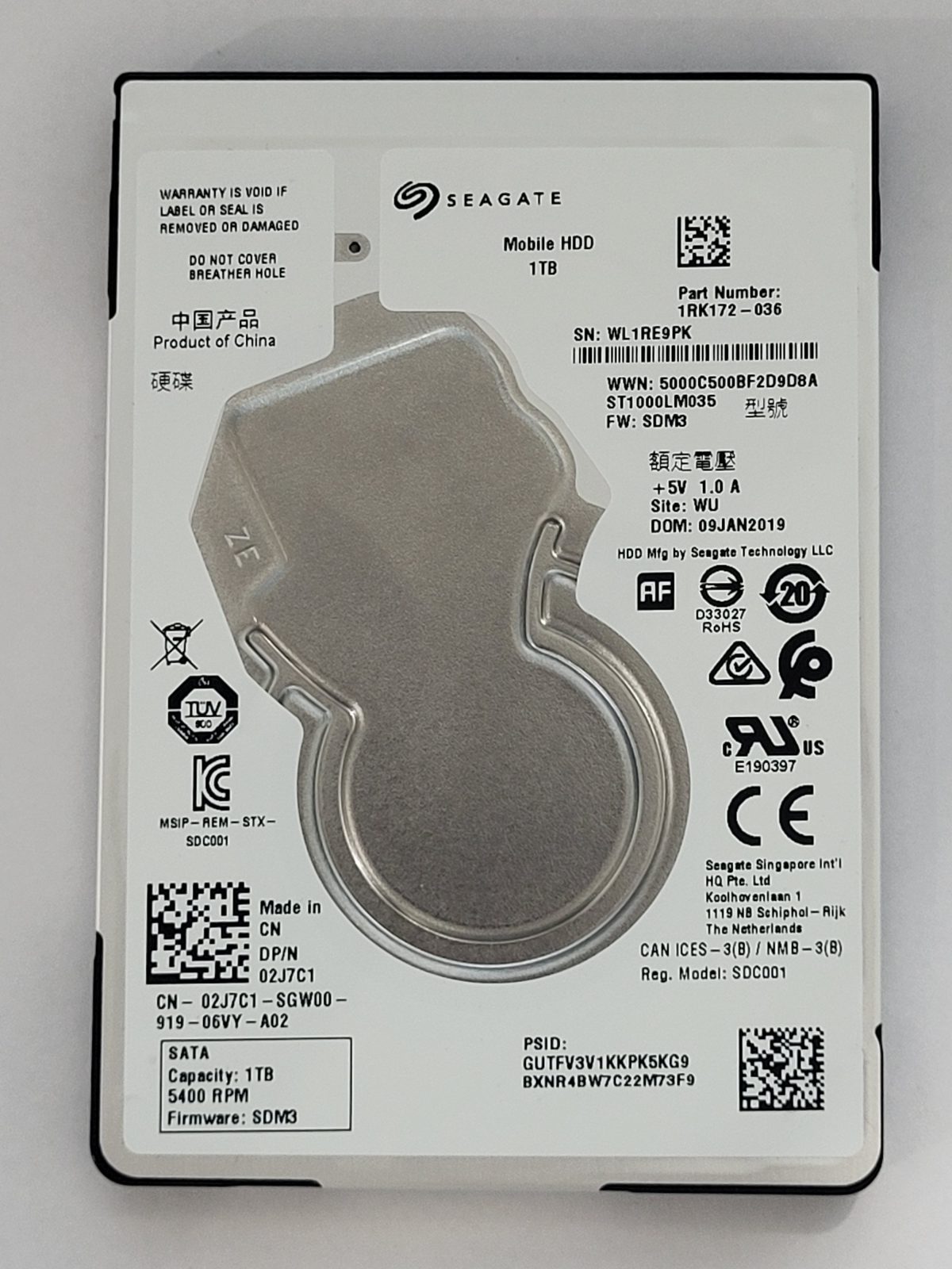 ST1000LM035, PN:1RK172-036, SN:WL1, WU, FW:SDM3, 09 JAN 2019 | Seagate 1To 2,5" SATA HDD STK