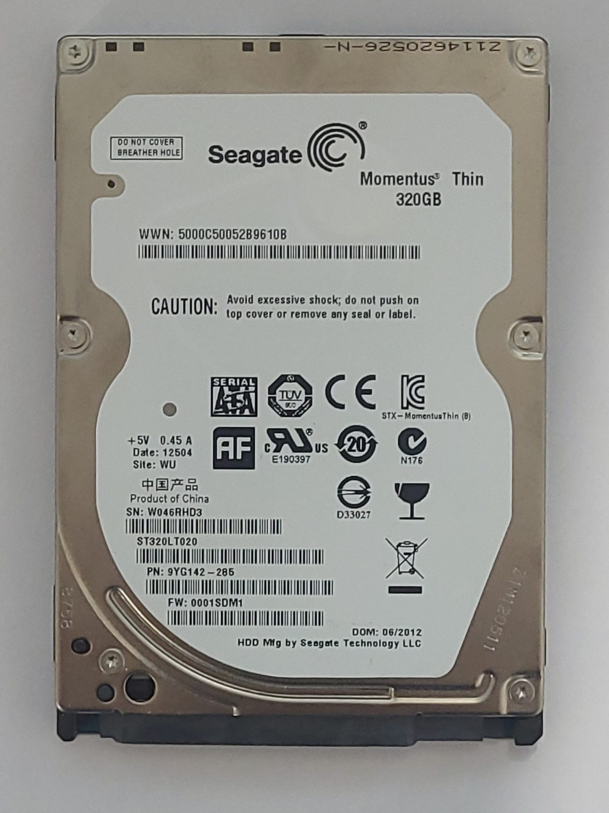 ST320LT020, PN:9YG142-285, SN:W04, WU, FW:0001SDM1, 12504 | Seagate 320Go 2,5" SATA HDD STK