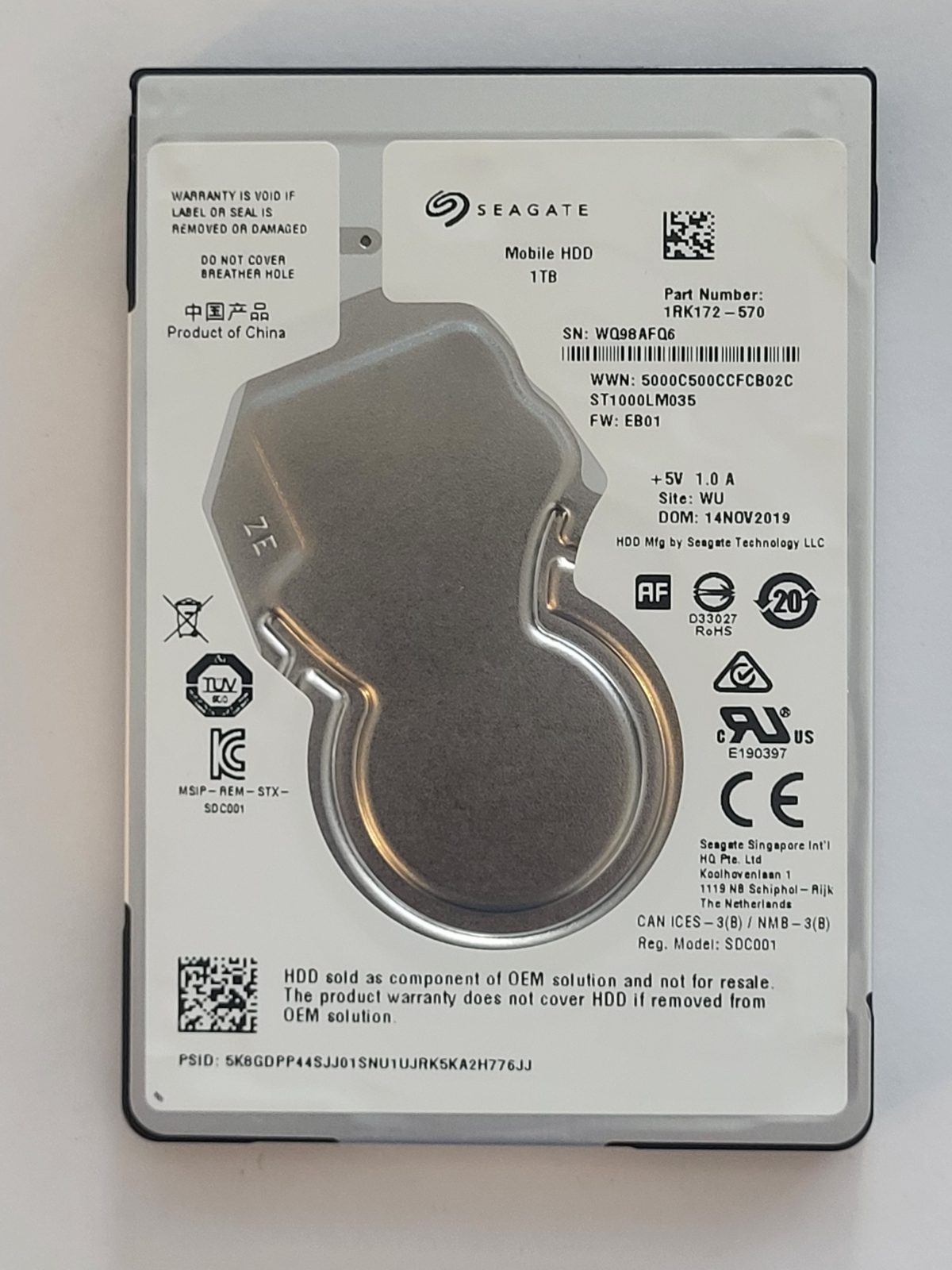 ST1000LM035, PN:1RK172-570, SN:WQ9, WU, FW:EB01, 14 NOV 2019 | Seagate 1To 2,5" SATA HDD STK
