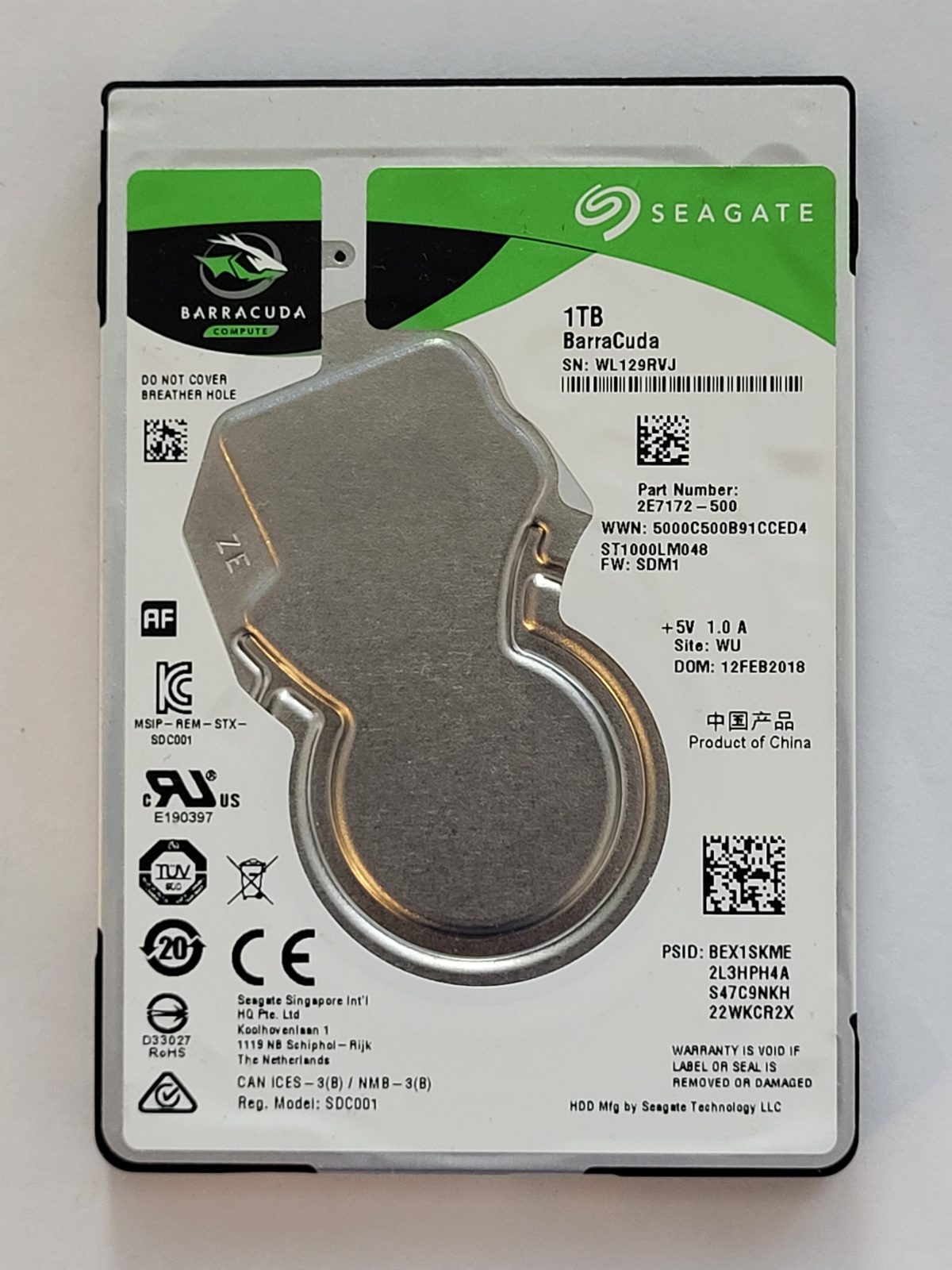 ST1000LM048, PN:2E7172-500, SN:WL1, WU, FW:SDM1, 12 FEB 2018 | Seagate 1To 2,5" SATA HDD STK