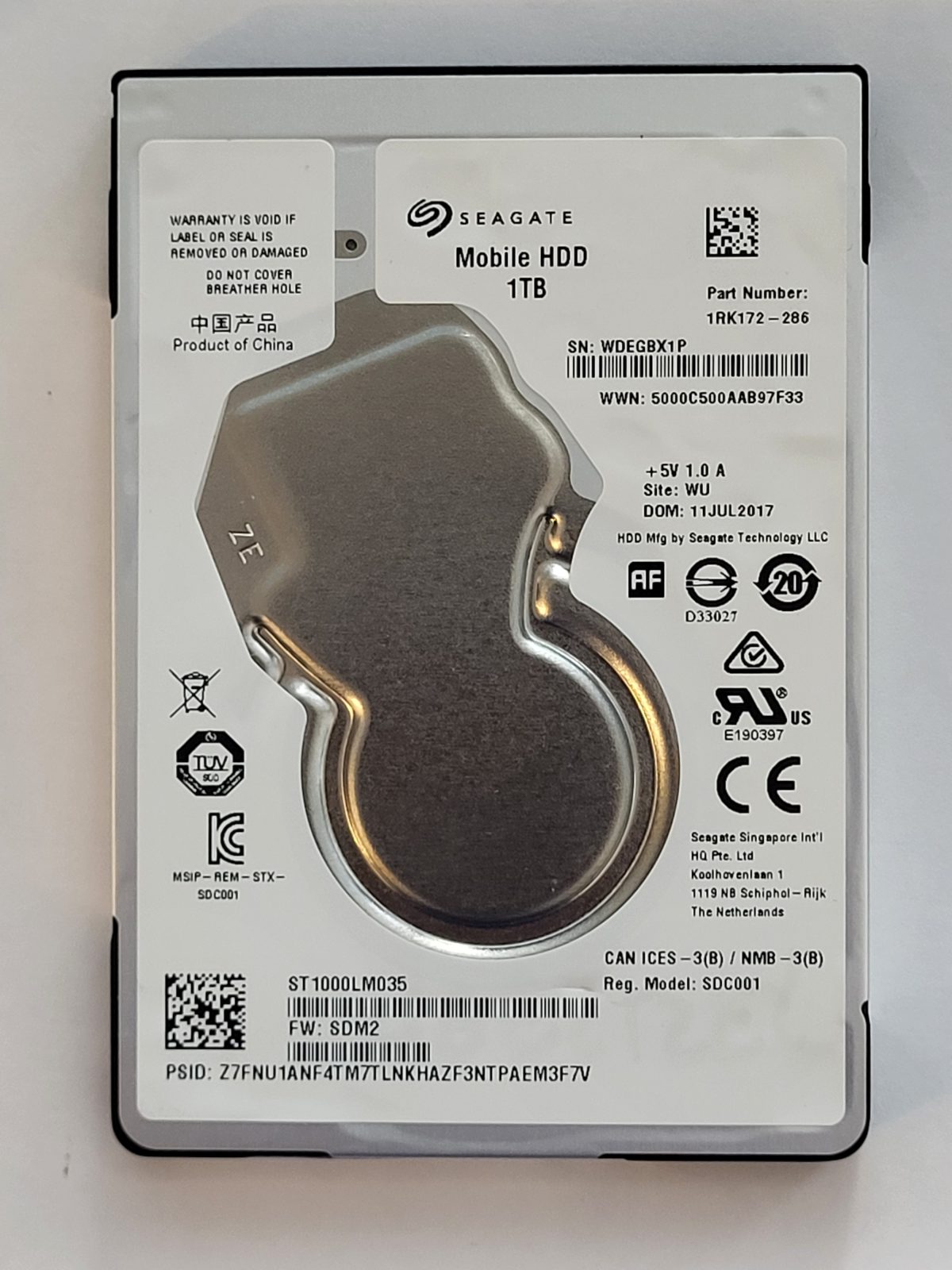 ST1000LM035, PN:1RK172-286, SN:WDE, WU, FW:SDM2, 11 JUL 2017 | Seagate 1To 2,5" SATA HDD STK