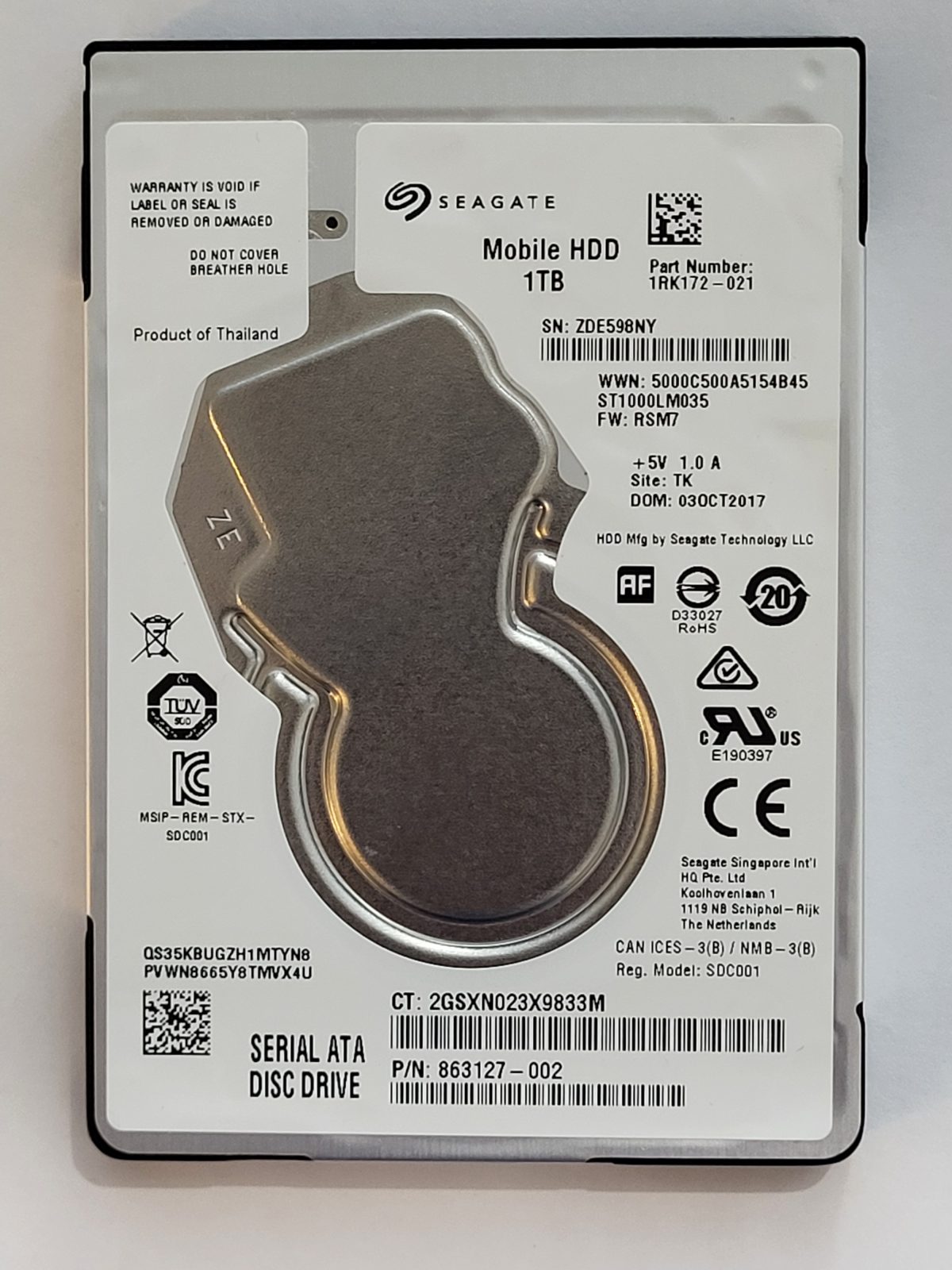 ST1000LM035, PN:1RK172-021, SN:ZDE, TK, FW:RSM7, 03 OCT 2017 | Seagate 1To 2,5" SATA HDD STK