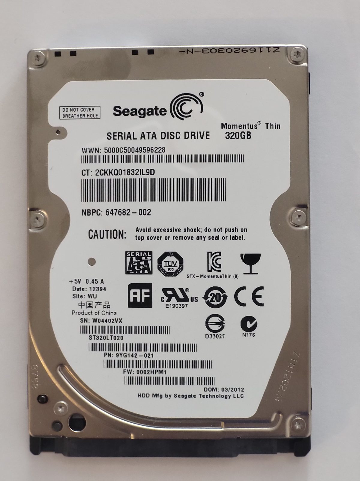ST320LT020, PN:9YG142-021, SN:W04, WU, FW:2HPM1, 12394 | Seagate 320Go 2,5" SATA HDD STK