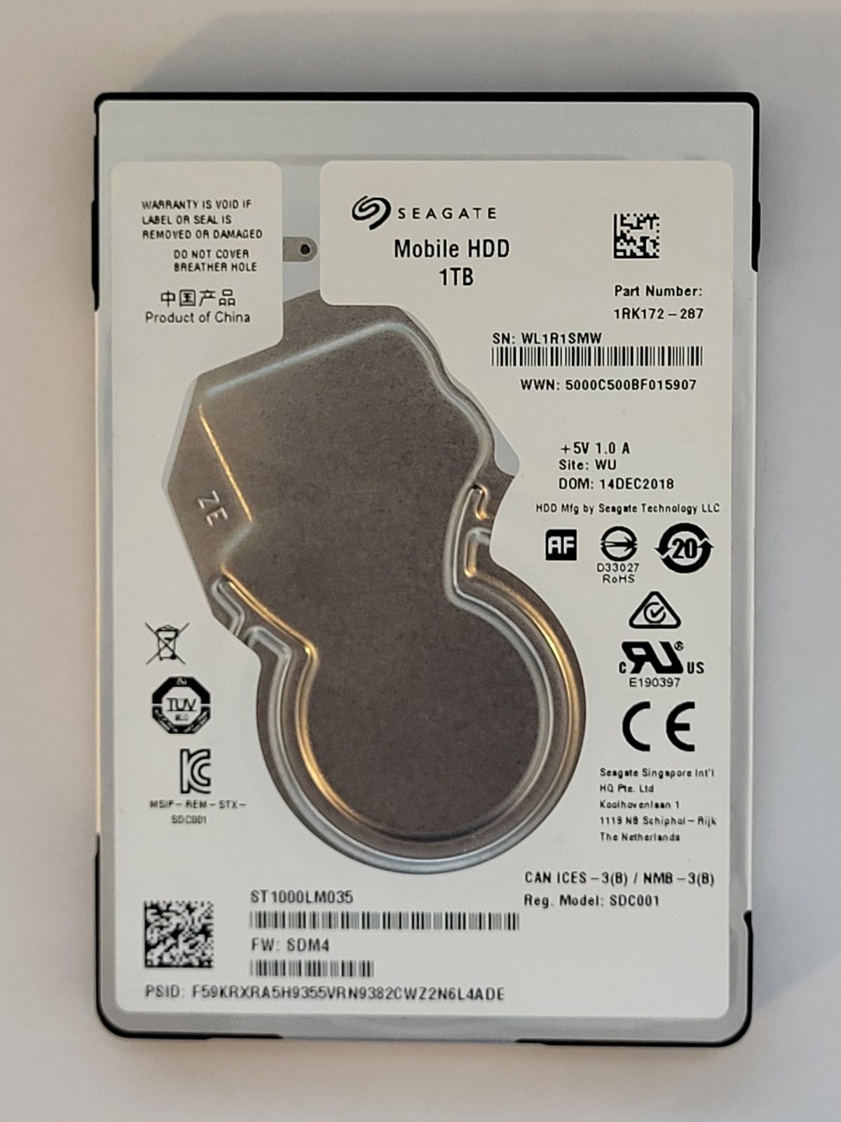 ST1000LM035, PN:1RK172-287, SN:WL1, WU, FW:SDM4, 14 DEC 2018 | Seagate 1To 2,5" SATA HDD STK