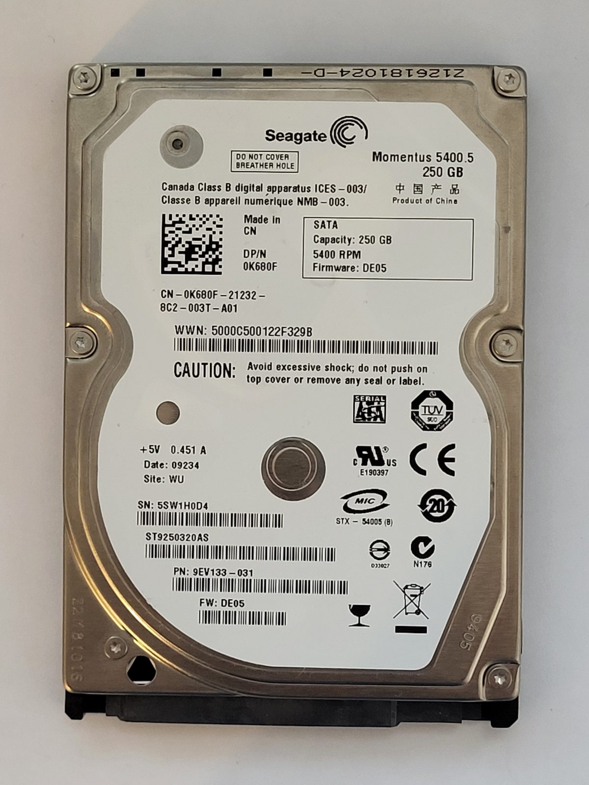 ST9250320AS, PN:9EV133-031, SN:5SW, WU, FW:DE05, 09234 | Seagate 250Go 2,5" SATA HDD STK