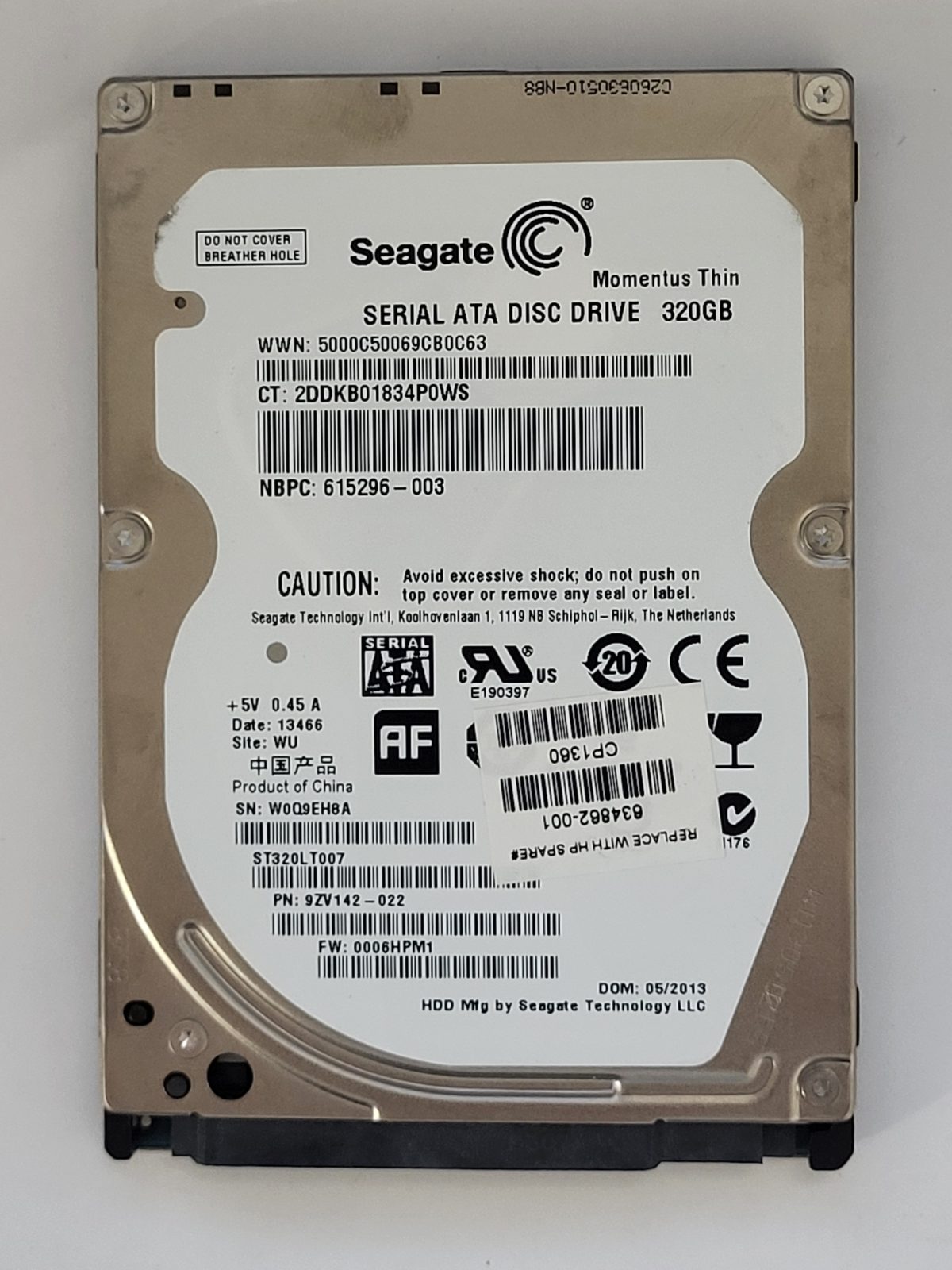 ST320LT007, PN:9ZV142-022, SN:W0Q, WU, FW:0006HPM1, 13466 | Seagate 320Go 2,5" SATA HDD STK