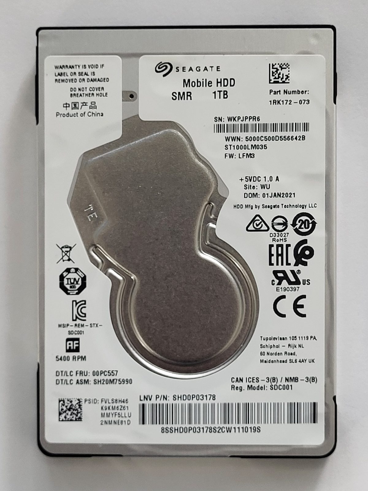ST1000LM035, PN:1RK172-073, SN:WKP, WU, FW:LFM3, 01 JAN 2021 | Seagate 1To 2,5" SATA HDD STK