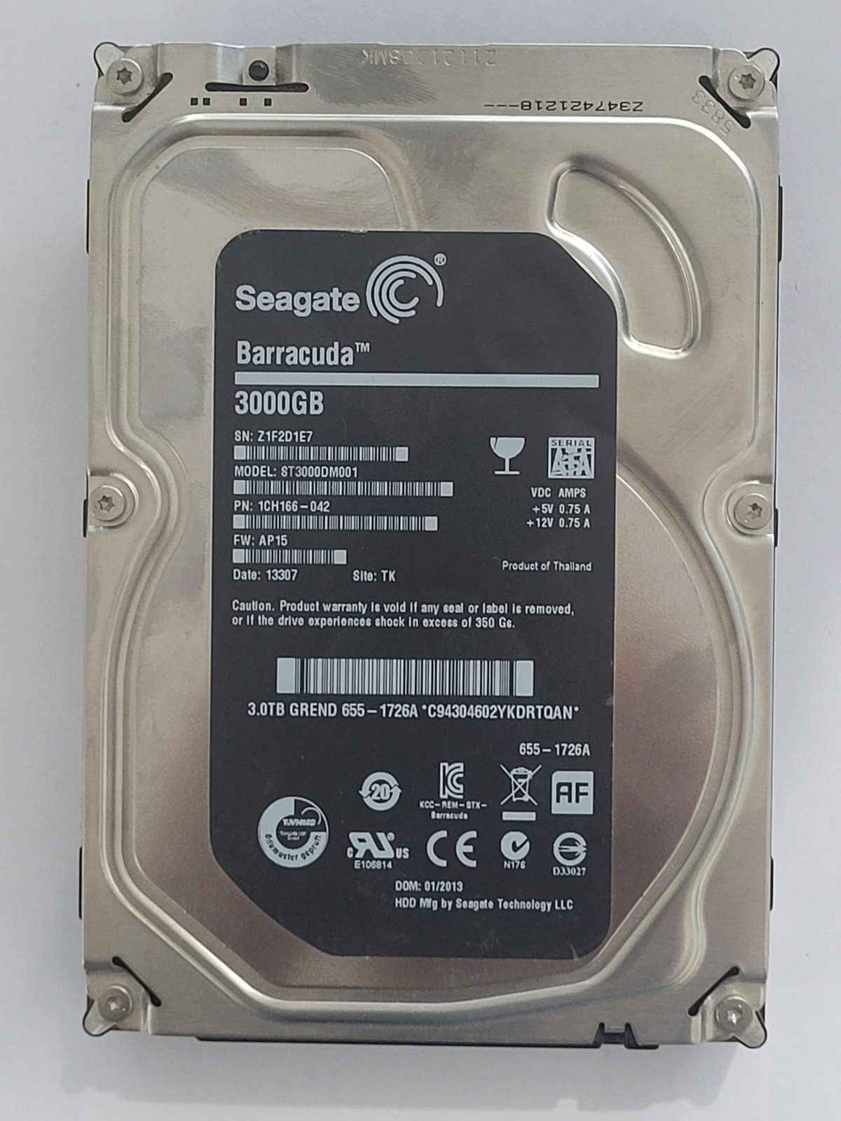 ST3000DM001, PN:1CH166-042, SN:Z1F, TK, FW:AP15, 13307 | Seagate 3To 3,5" SATA HDD STK