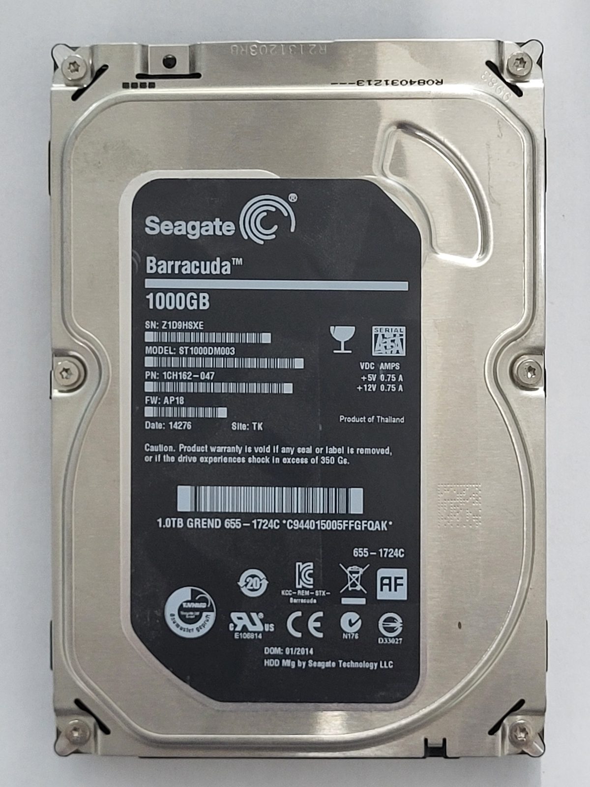 ST1000DM003, PN:1CH164-047, SN:Z1D, TK, FW:AP18, 14276 | Seagate 1To 3,5" SATA HDD STK