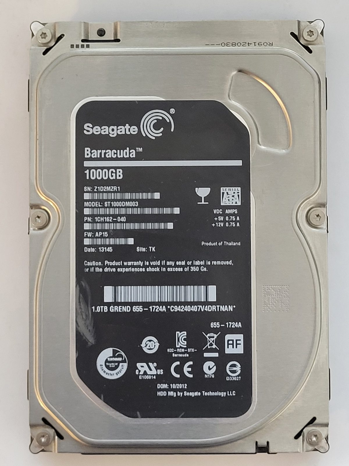 ST1000DM003, PN:1CH162-040, SN:Z1D, TK, FW:AP15, 13145 | Seagate 1To 3,5" SATA HDD STK