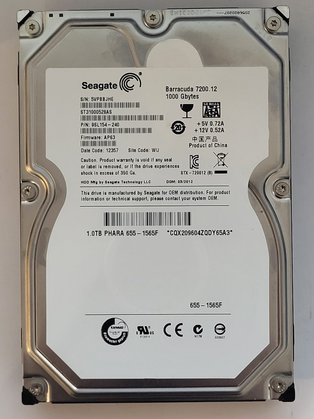 ST31000528AS, PN:9SL154-240, SN:5VP, WU, FW:AP63, 12357 | Seagate 1To 3,5" SATA HDD STK