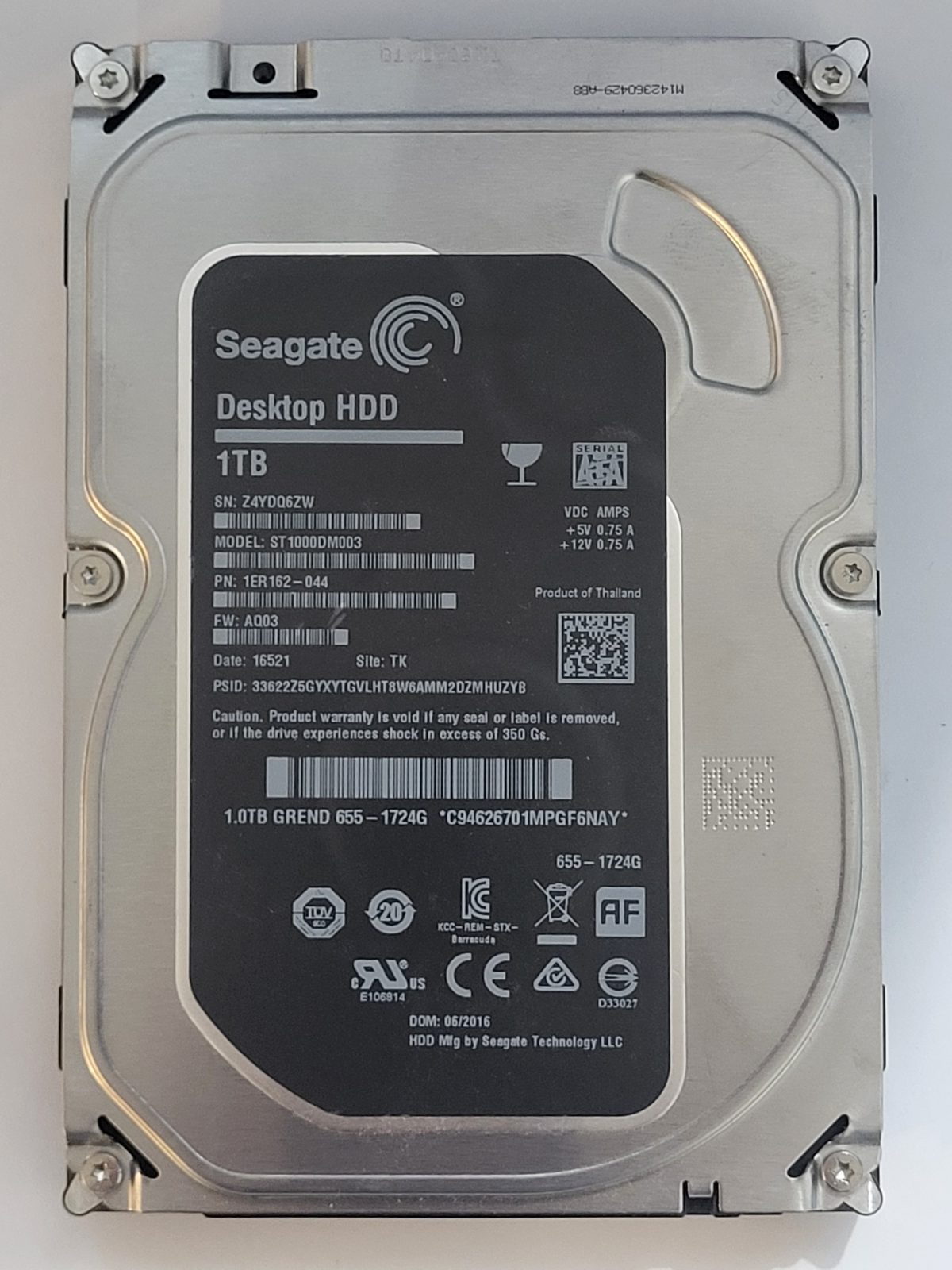 ST1000DM003, PN:1ER162-044, SN:Z4Y, TK, FW:AQ03, 16521 | Seagate 1To 3,5" SATA HDD STK