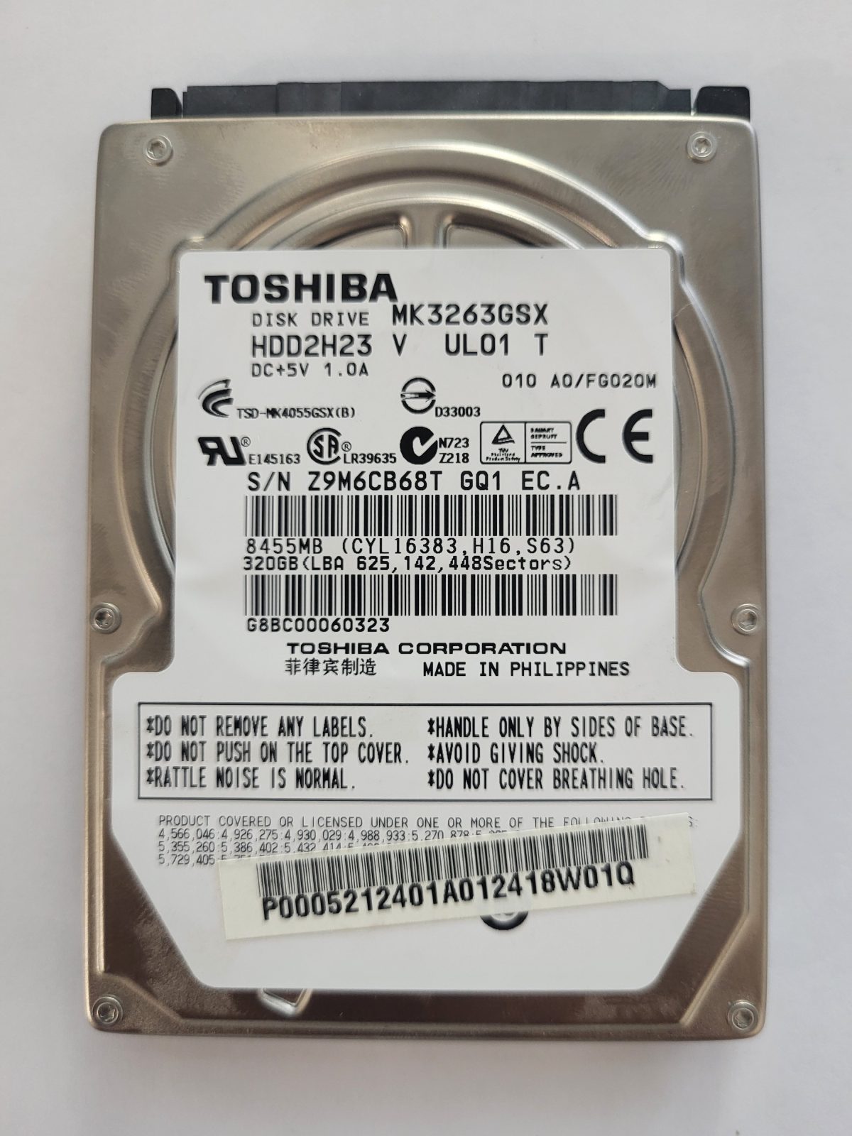 MK3263GSX, HDD2H23 V UL01 T, FW: A0/FG020M, -, Toshiba 320Gb 2.5" HDD STK