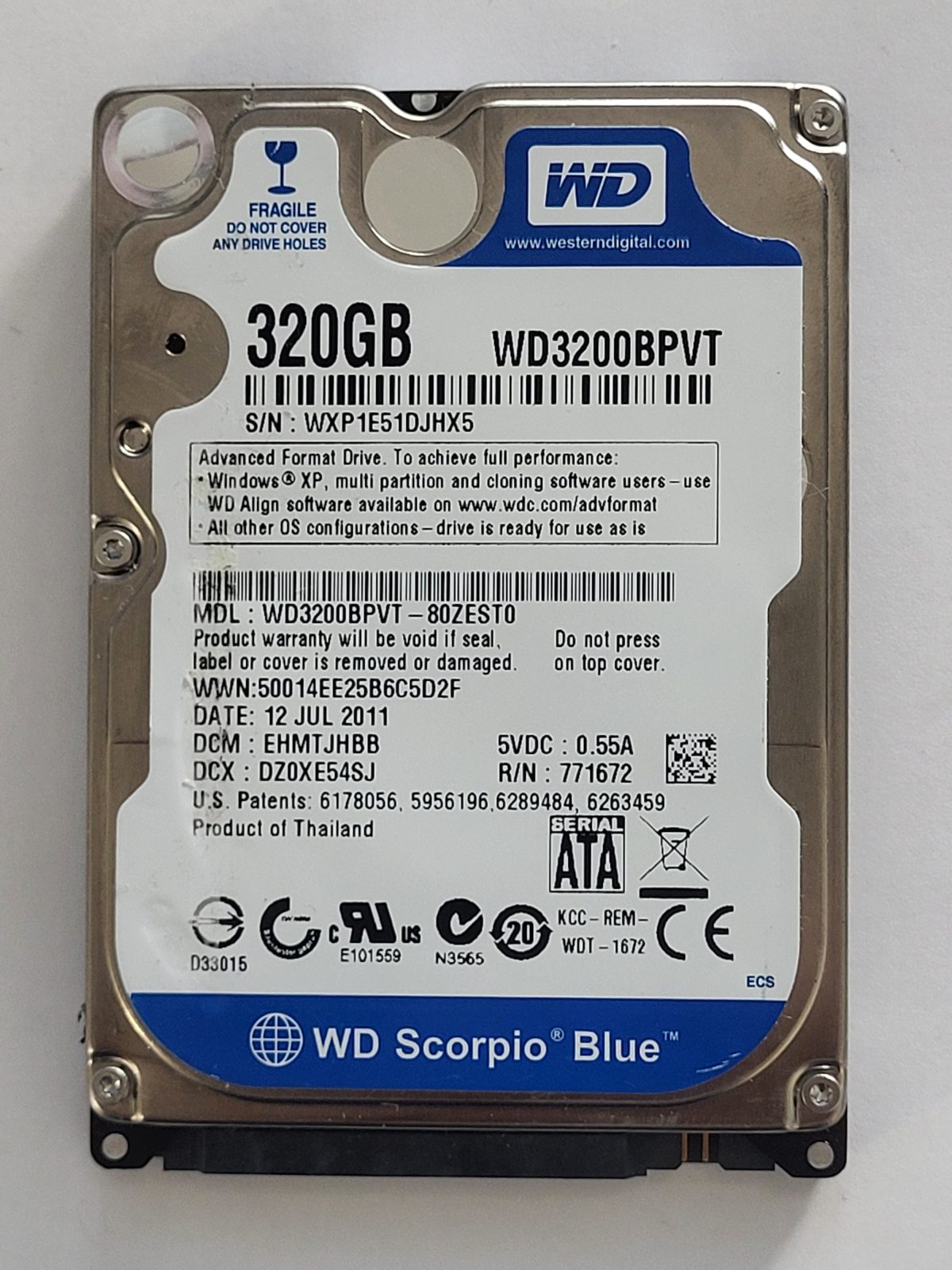 WD3200BPVT-80ZEST0, DCM: EHMTJHBB, 12 JUL 2011 | WD 320Go 2,5" SATA HDD STK