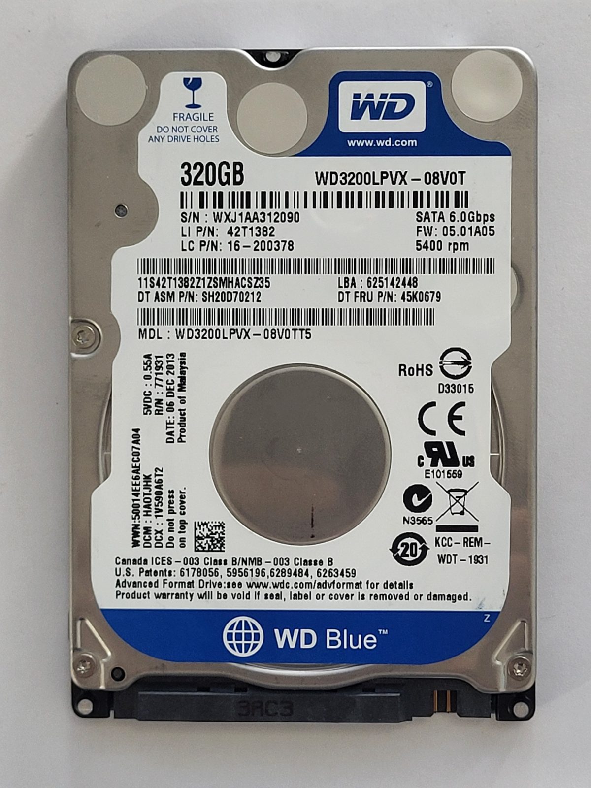 WD3200LPVX-08V0TT5, DCM: HAOTJHK, 06 DEC 2013 | WD 320Go 2,5" SATA HDD STK