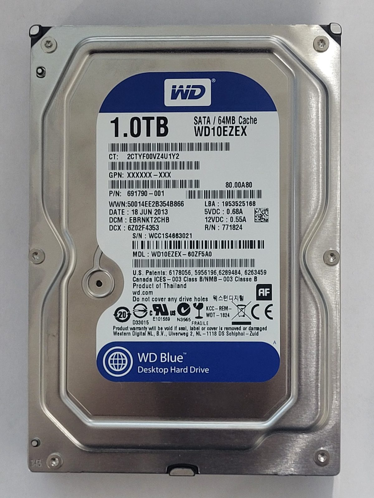 WD10EZEX-60ZF5A0, DCM: EBRNKT2CHB, 18 JUN 2013 | WD 1To 3,5" SATA HDD STK